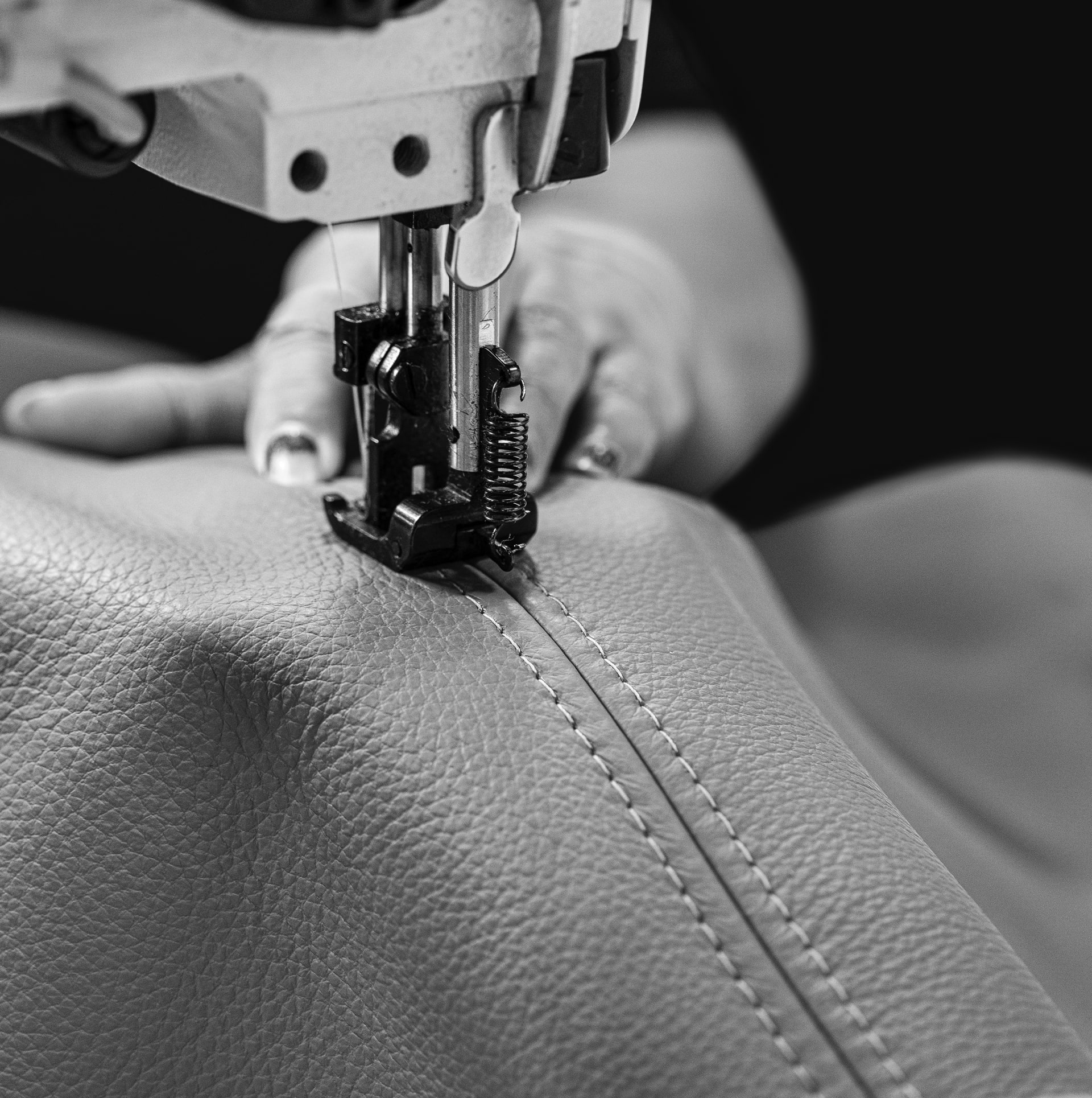 Lippert Furniture Manufacturing Plant Worker Sewing RV Furniture Fabric Using a Sewing Machine